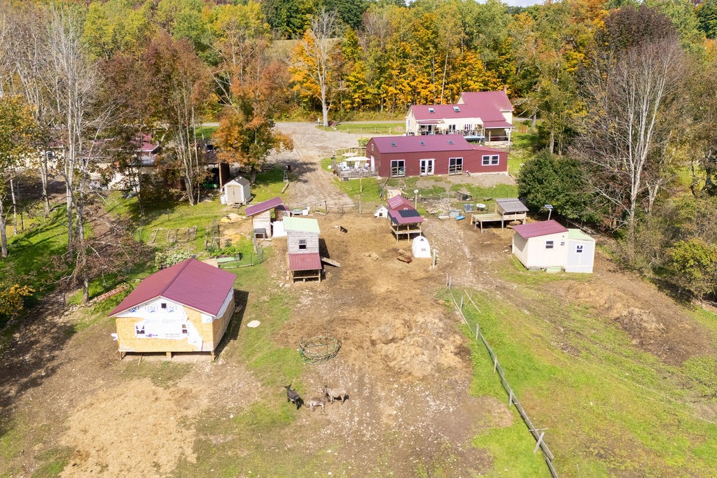 1668 Vandervort Hill Road Unadilla, NY 13849 - Photo 44 of 50 Several outbuildings and fenced pastures dot this sprawling rural property surrounded by mature trees.