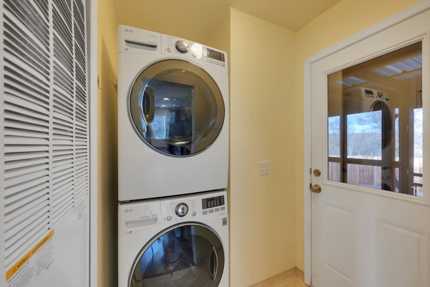 4485 Sites Lodoga Road Stonyford, CA 95979 - Photo 33 of 66 a view of a hallway with washer and dryer