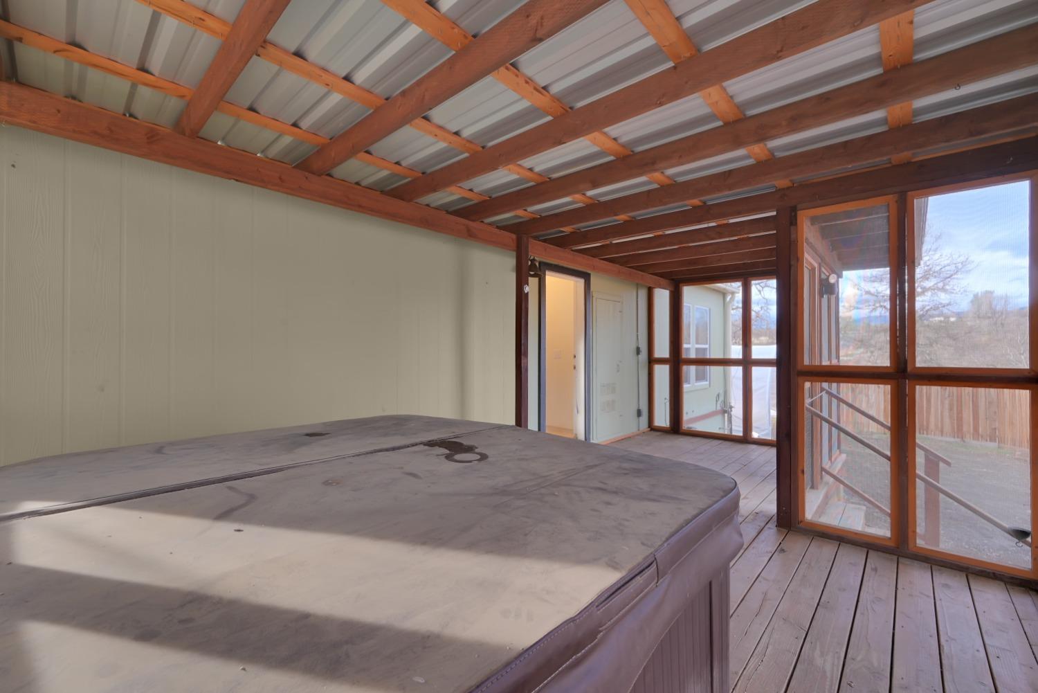 4485 Sites Lodoga Road Stonyford, CA 95979 - Photo 36 of 66 a view of a room with wooden floor and iron stairs