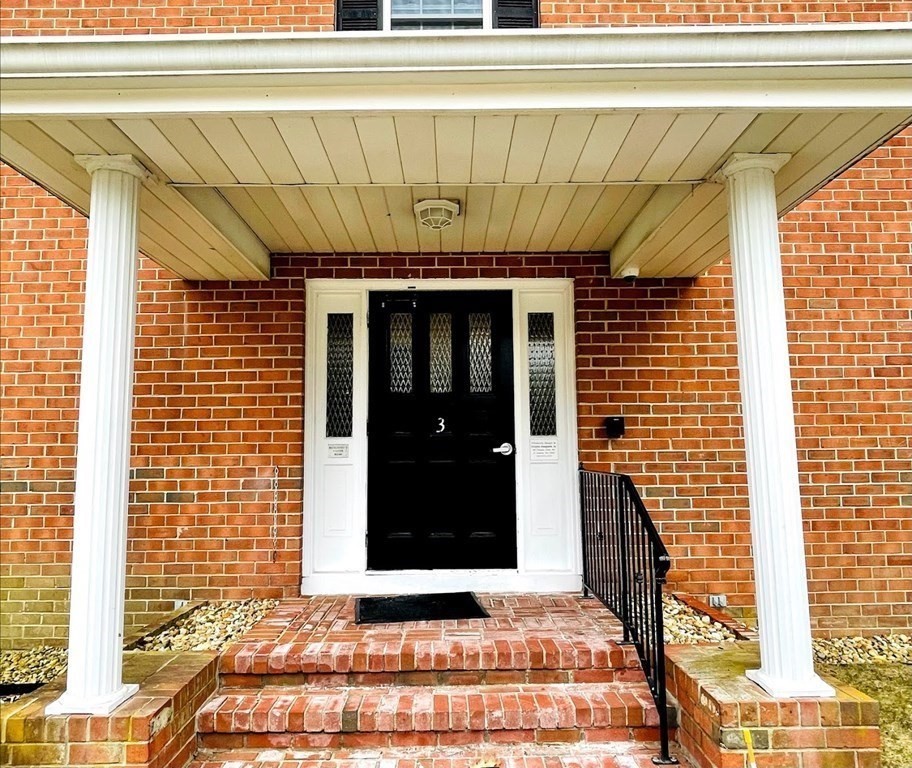 63 Leonard Road, Unit 63 Boxborough, MA 01719 - Photo 3 of 17 a front view of a house with a