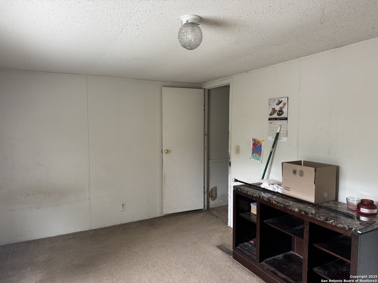 509 Maple Street Jourdanton, TX 78026 - Photo 11 of 14 a view of a room with gym equipment