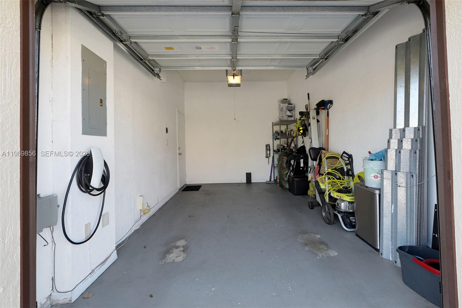 22168 Southwest 88th Path Cutler Bay, FL 33190 - Photo 19 of 27 1 car garage and Tesla charger