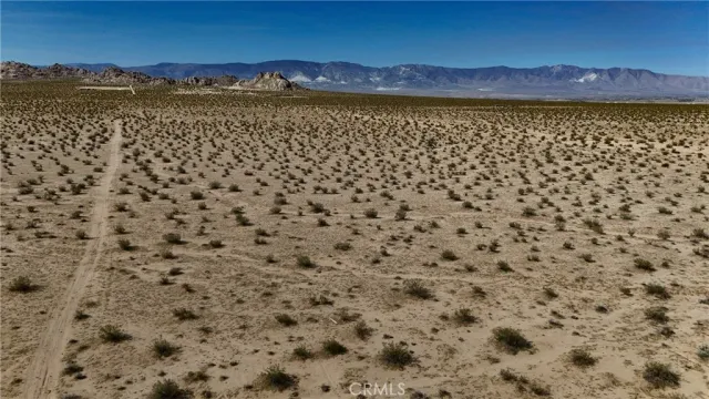 a view of an ocean and mountain