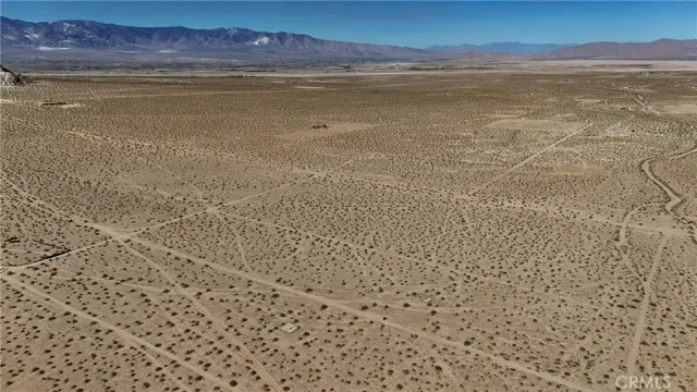 a view of a house with a mountain