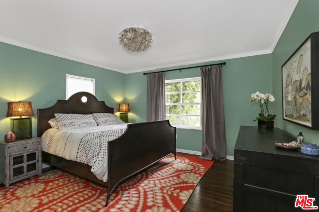 3801 Roderick Road Los Angeles, CA 90065 - Photo 17 of 38 a bedroom with a bed and window