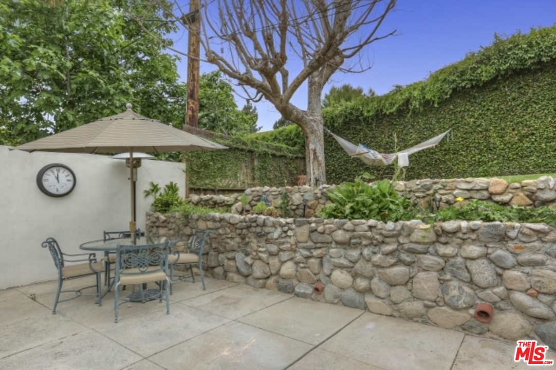 3801 Roderick Road Los Angeles, CA 90065 - Photo 33 of 38 a view of a chairs and table in backyard