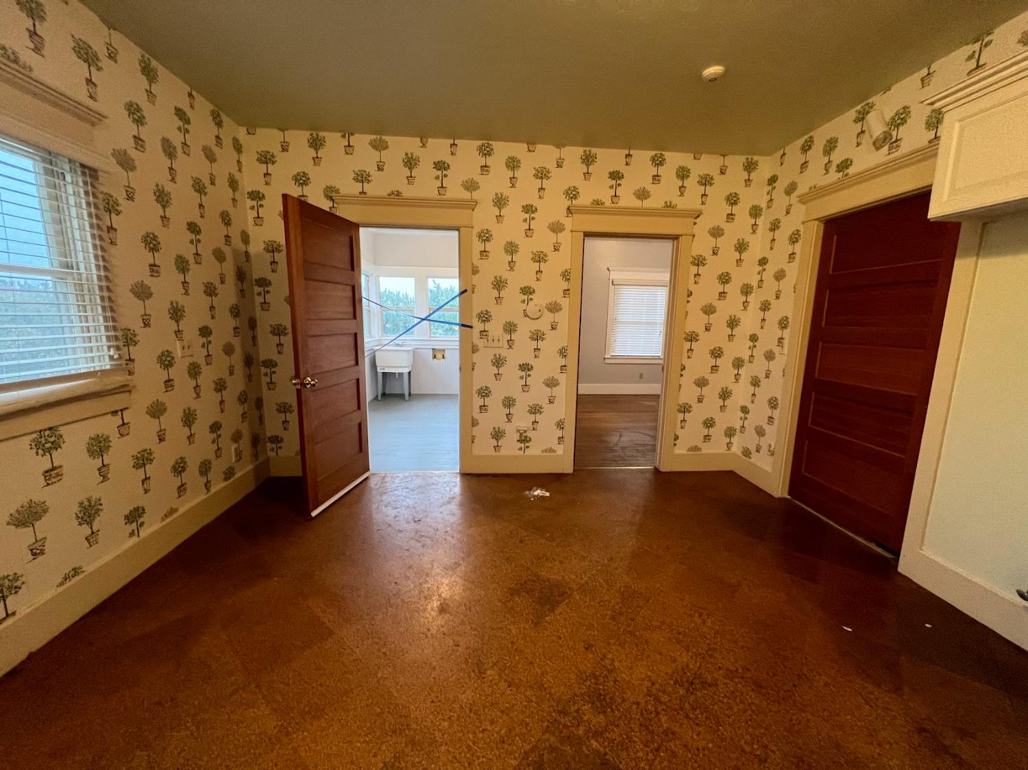 19076 East Central Avenue Reedley, CA 93654 - Photo 9 of 16 a view of an empty room with window and wooden floor