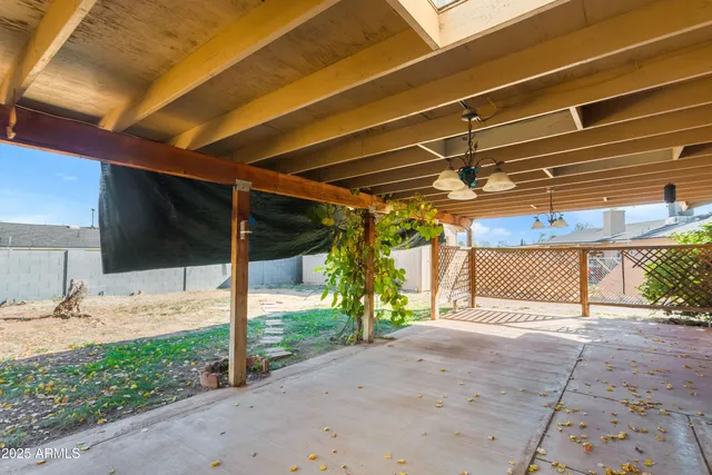 a view of a backyard of the house