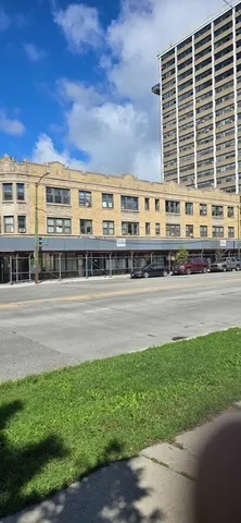 a view of building with yard