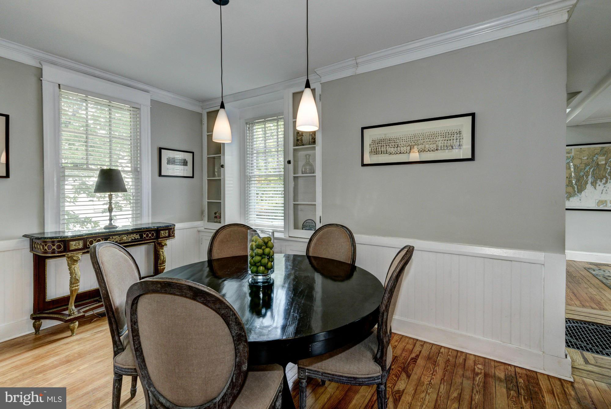 742 Anneslie Road Baltimore, MD 21212 - Photo 8 of 30 Dining Room built-in glass-doored shelves