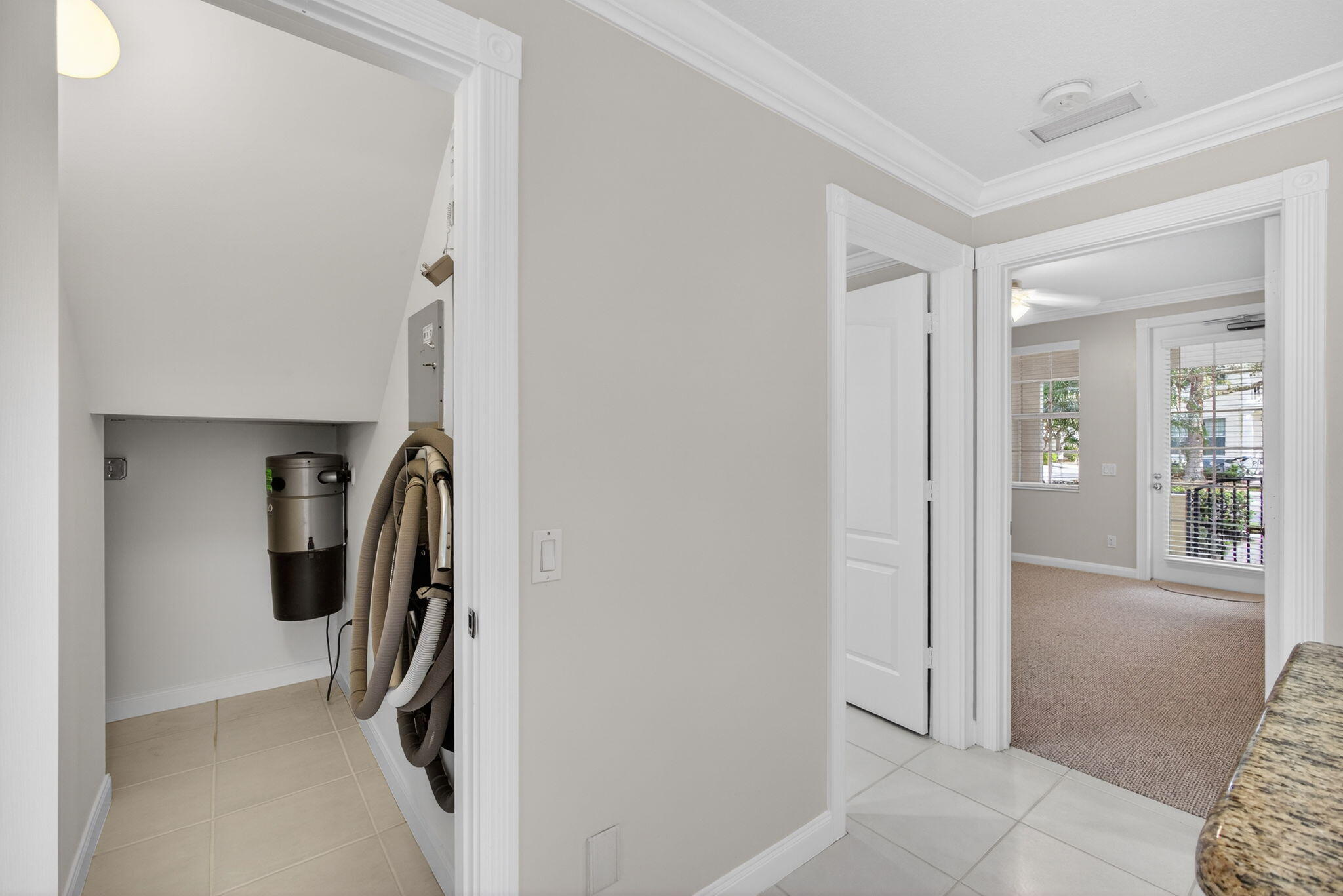 4118 Parkside Drive Jupiter, FL 33458 - Photo 12 of 73 a view of a hallway with closet and a couch