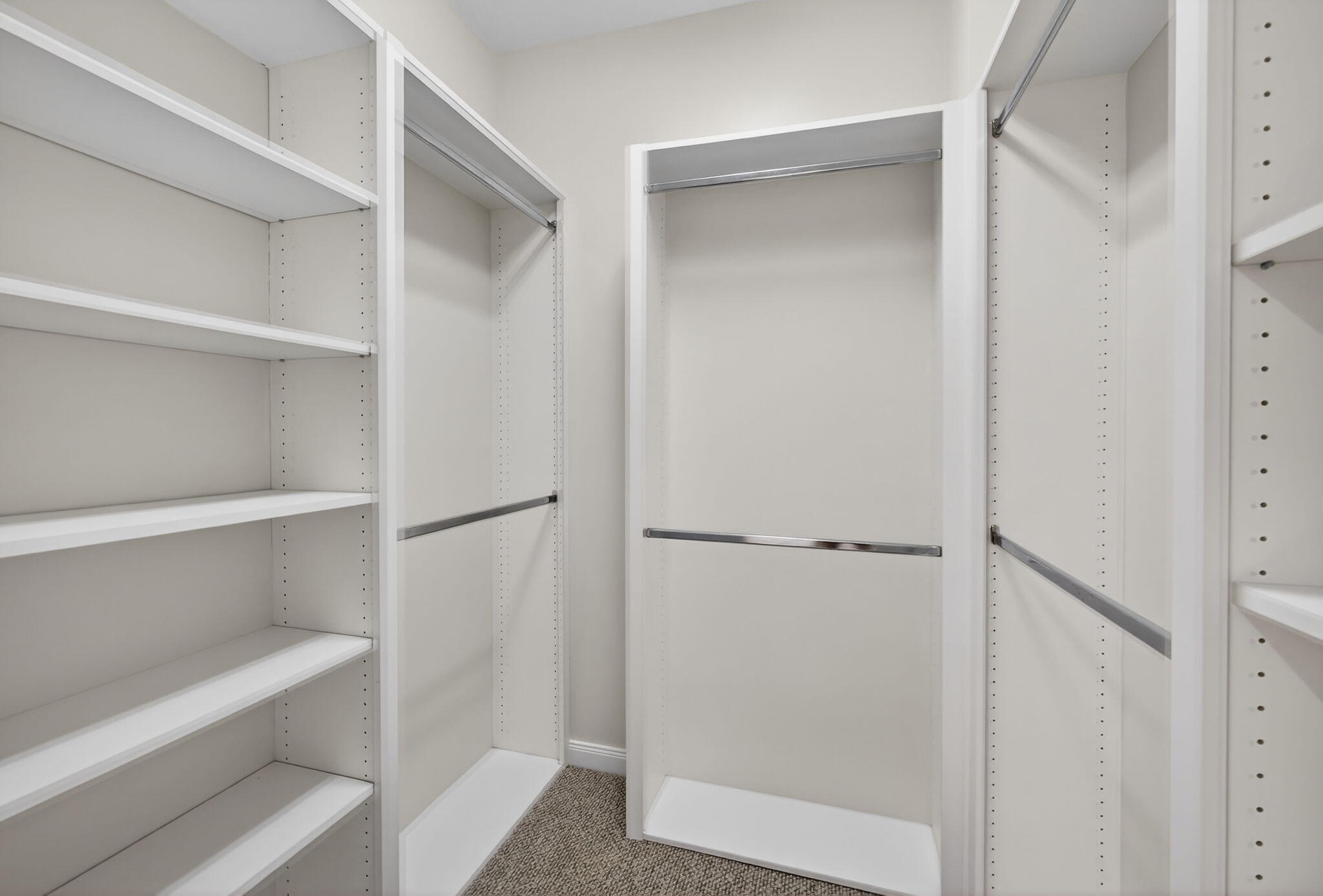 4118 Parkside Drive Jupiter, FL 33458 - Photo 39 of 73 a view of walk in closet with empty racks