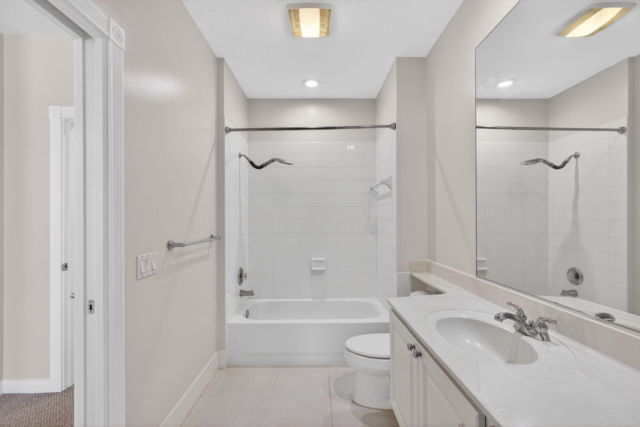 4118 Parkside Drive Jupiter, FL 33458 - Photo 40 of 73 a bathroom with a sink a toilet and shower