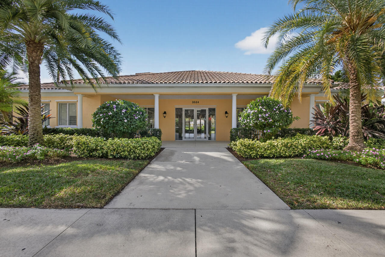 4118 Parkside Drive Jupiter, FL 33458 - Photo 58 of 73 a view of a house with a garden