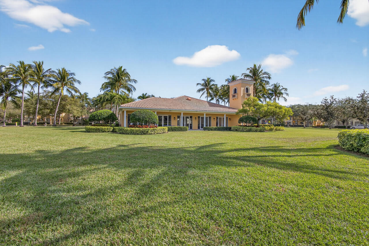 4118 Parkside Drive Jupiter, FL 33458 - Photo 63 of 73 TUSCANY CLUBHOUSE GRASS AREA
