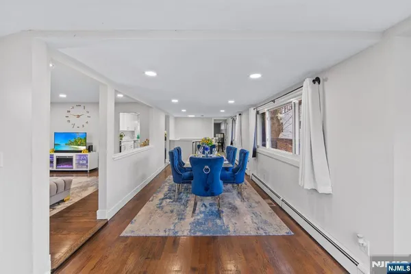 a view of a storage & utility room with wooden floor