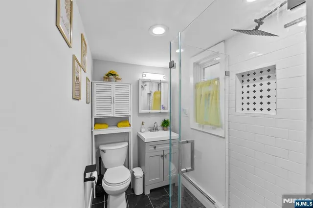 a view of a storage & utility room with wooden floor