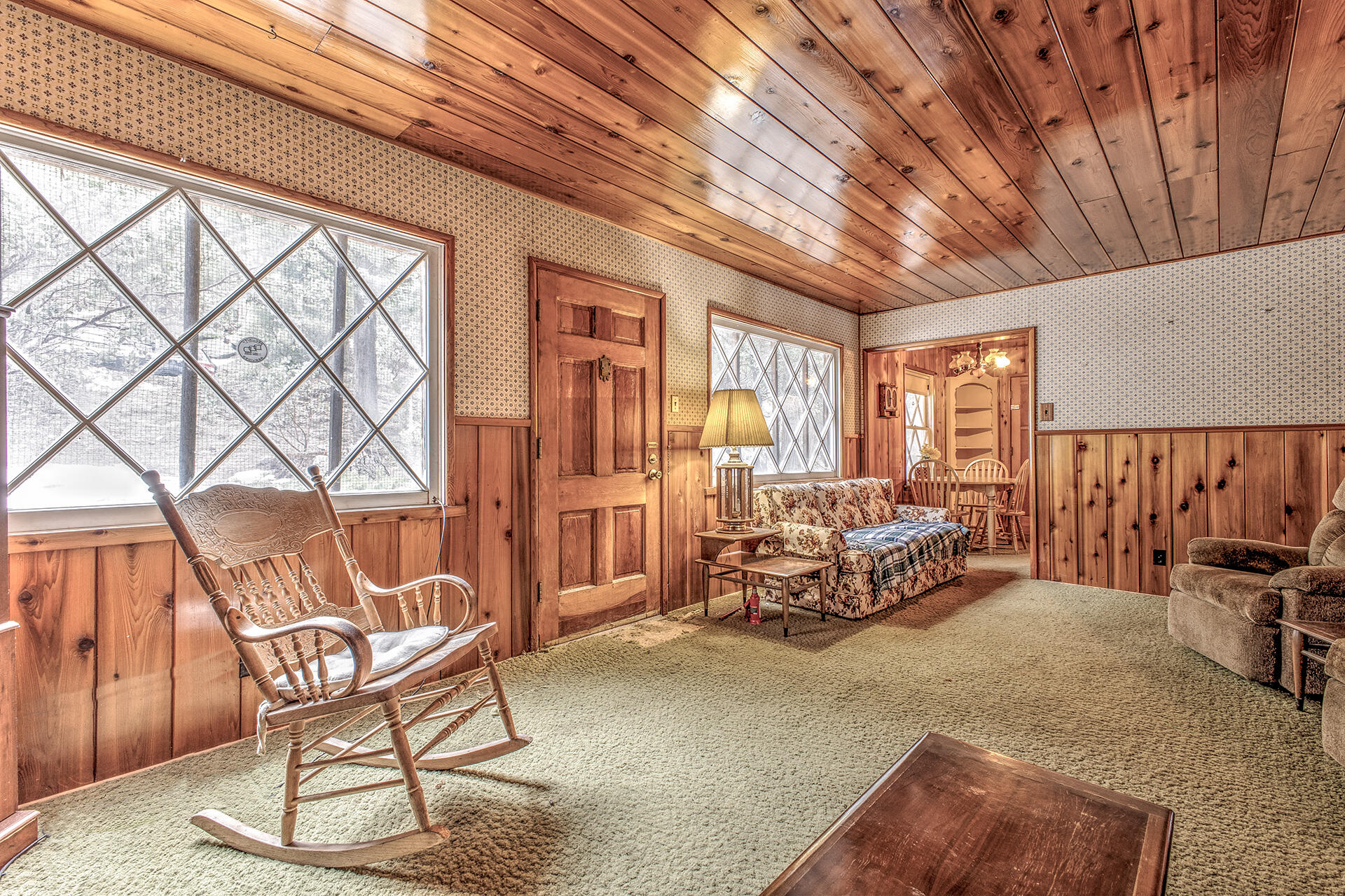 53250 Middleridge Drive Idyllwild, CA 92549 - Photo 13 of 30 a bedroom with furniture and a chandelier