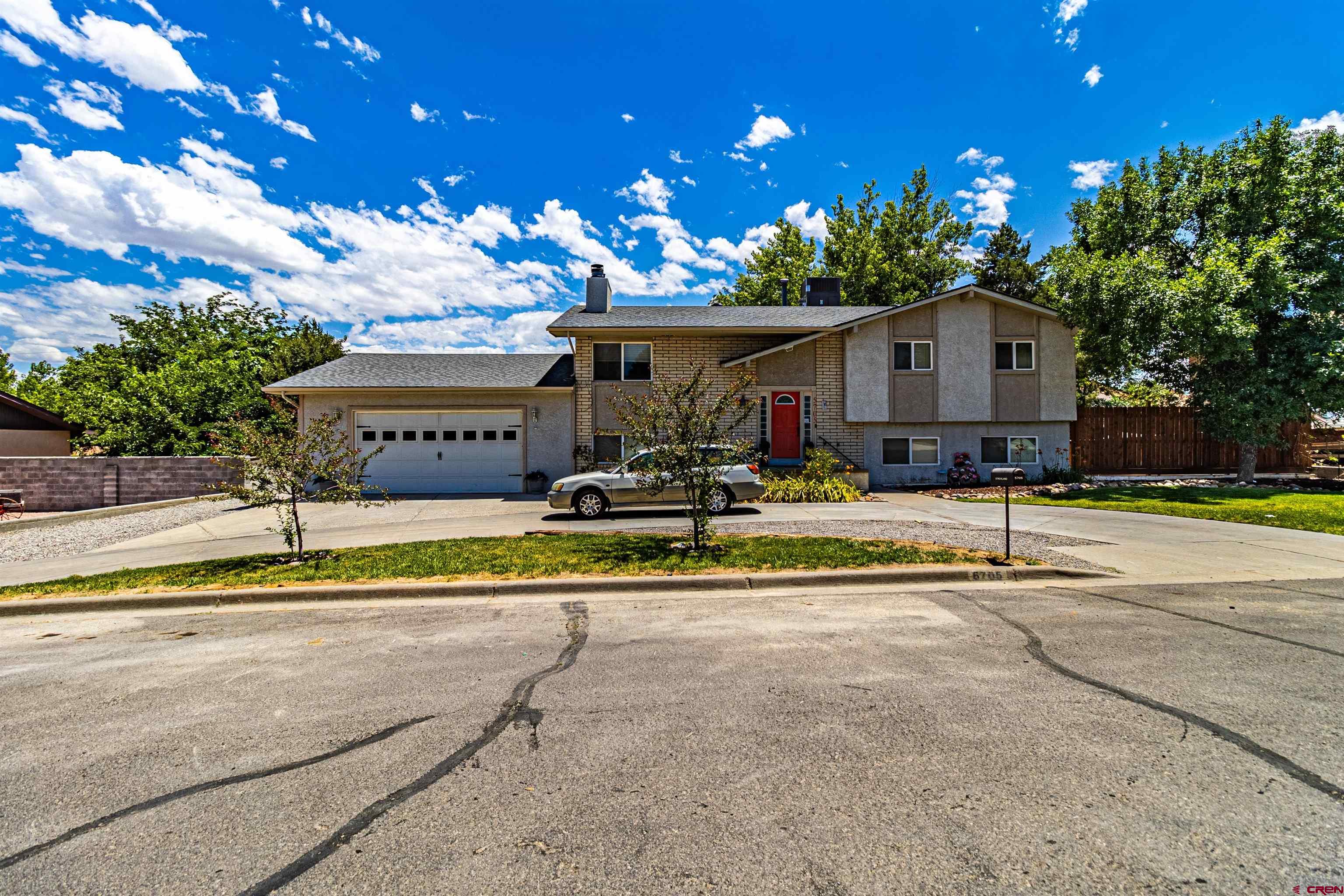 5705 Ravella Drive Farmington, NM 87402 - Photo 1 of 35 a view of a house with swimming pool and a yard