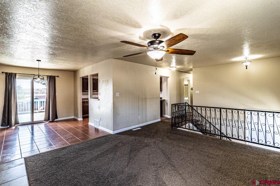 5705 Ravella Drive Farmington, NM 87402 - Photo 14 of 35 a view of an empty room