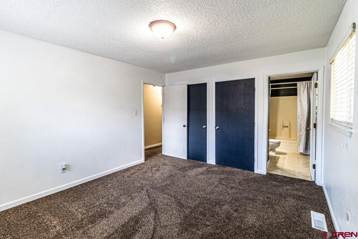 5705 Ravella Drive Farmington, NM 87402 - Photo 17 of 35 a view of a bedroom