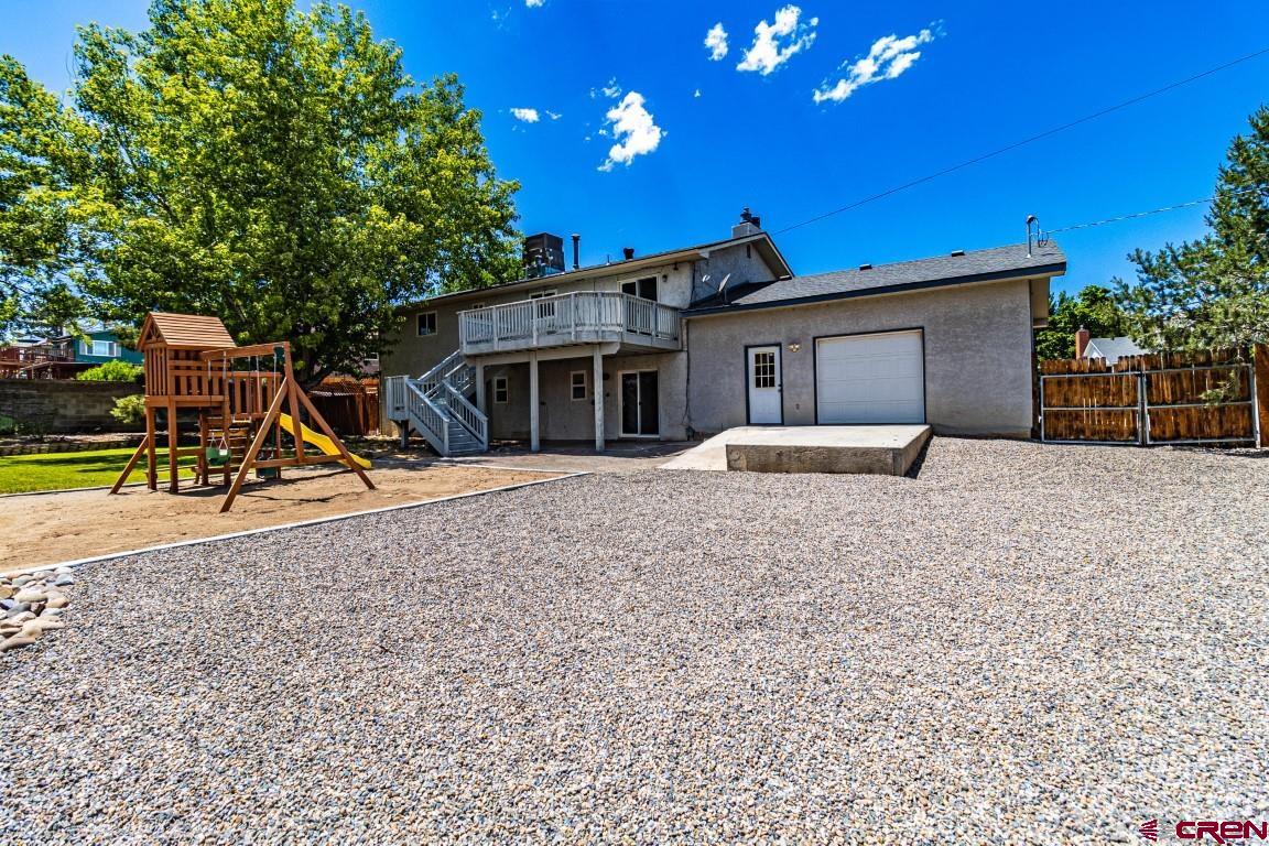 5705 Ravella Drive Farmington, NM 87402 - Photo 33 of 35 a house view with a sitting space and garden
