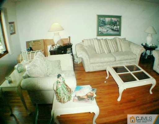 5 Conerly Road Somerset, NJ 08873 - Photo 2 of 8 a living room with furniture and a couch