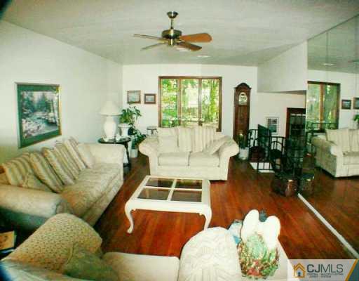 5 Conerly Road Somerset, NJ 08873 - Photo 5 of 8 a living room with furniture and a large window
