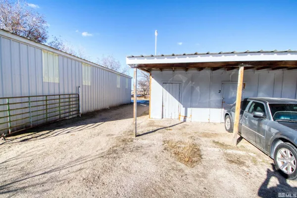 a view of a backyard of a house