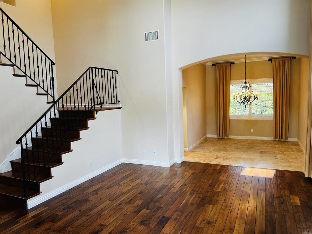 2834 Rancho Pancho Carlsbad, CA 92009 - Photo 11 of 73 a view of entryway with wooden floor