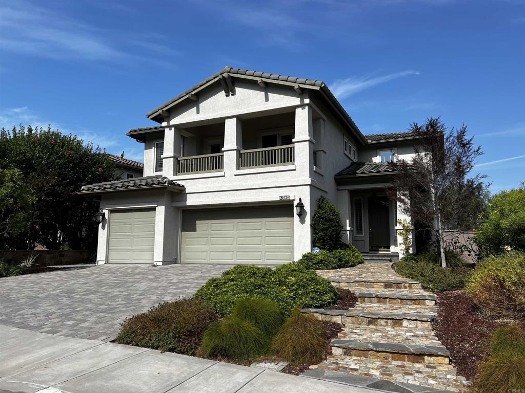 2834 Rancho Pancho Carlsbad, CA 92009 - Photo 2 of 73 a front view of a house with a yard