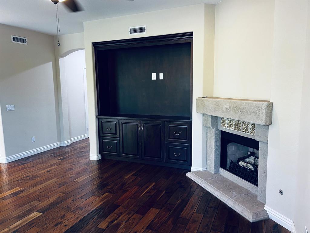 2834 Rancho Pancho Carlsbad, CA 92009 - Photo 25 of 73 a living room with a fireplace