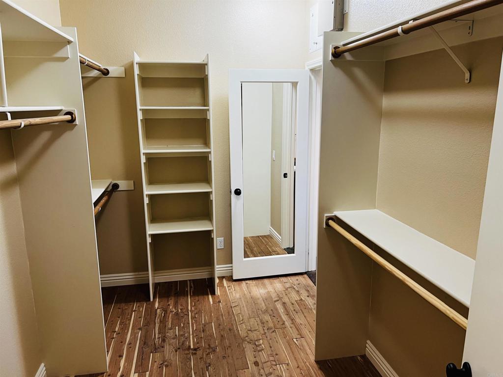 2834 Rancho Pancho Carlsbad, CA 92009 - Photo 49 of 73 a view of walk in closet with empty racks