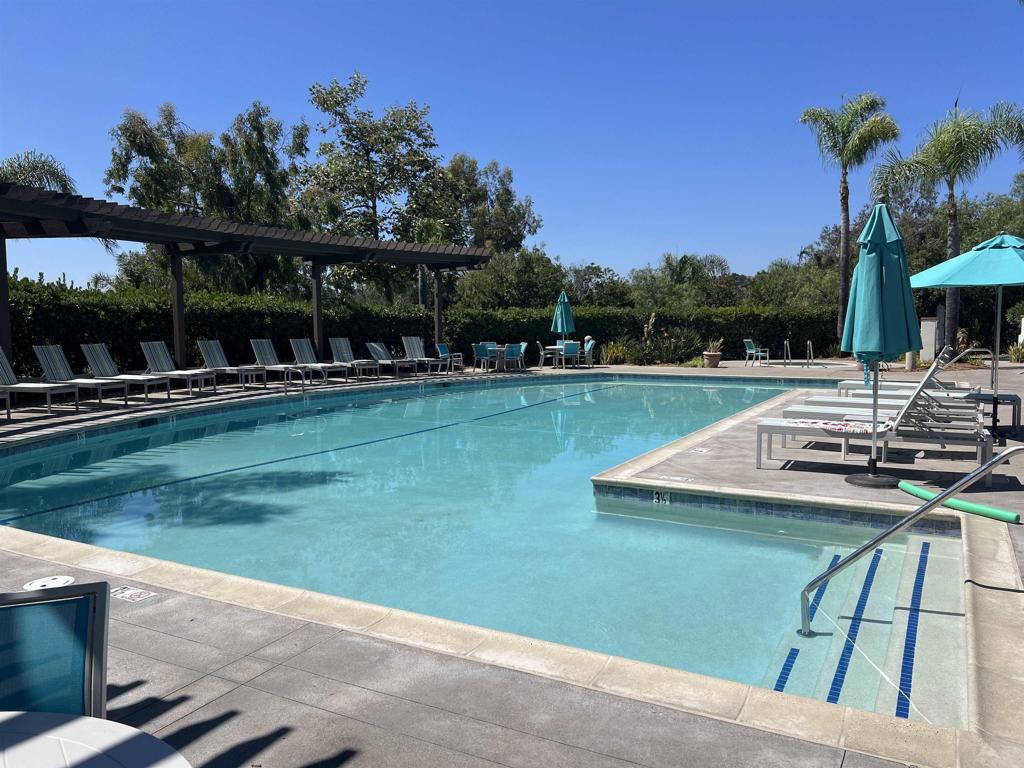 2834 Rancho Pancho Carlsbad, CA 92009 - Photo 69 of 73 a view of a swimming pool with a patio