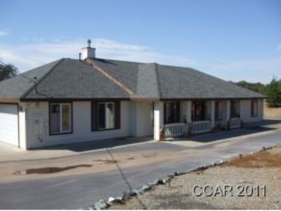 4204 Little John Road Copperopolis, CA 95228 - Photo 1 of 1 a front view of a house with a garage
