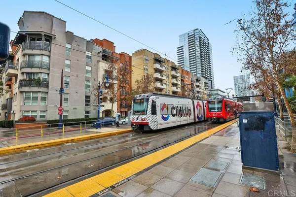 a view of building with yard and swimming pool