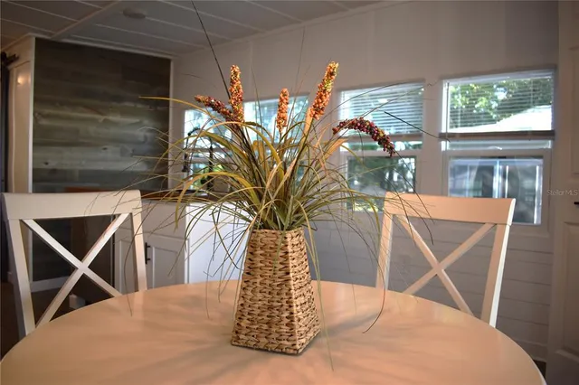 a kitchen with stainless steel appliances kitchen island granite countertop a refrigerator a stove a sink and a microwave