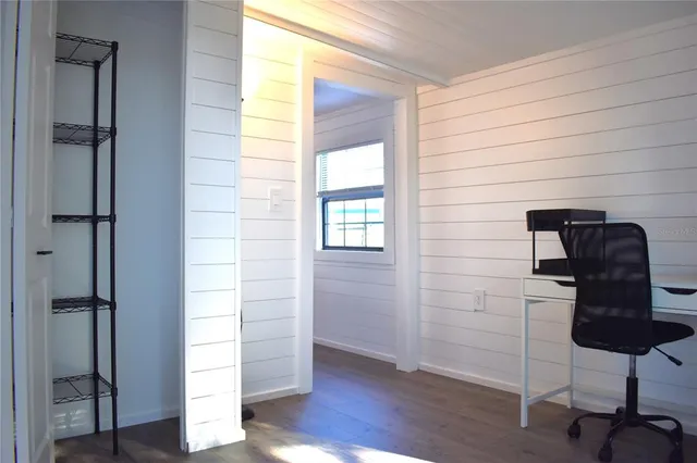 a view of building with outdoor space and trees