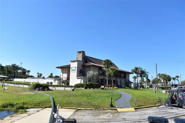 a view of a golf course with a lake