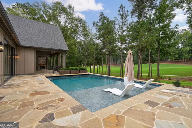 a lobby with furniture and rug