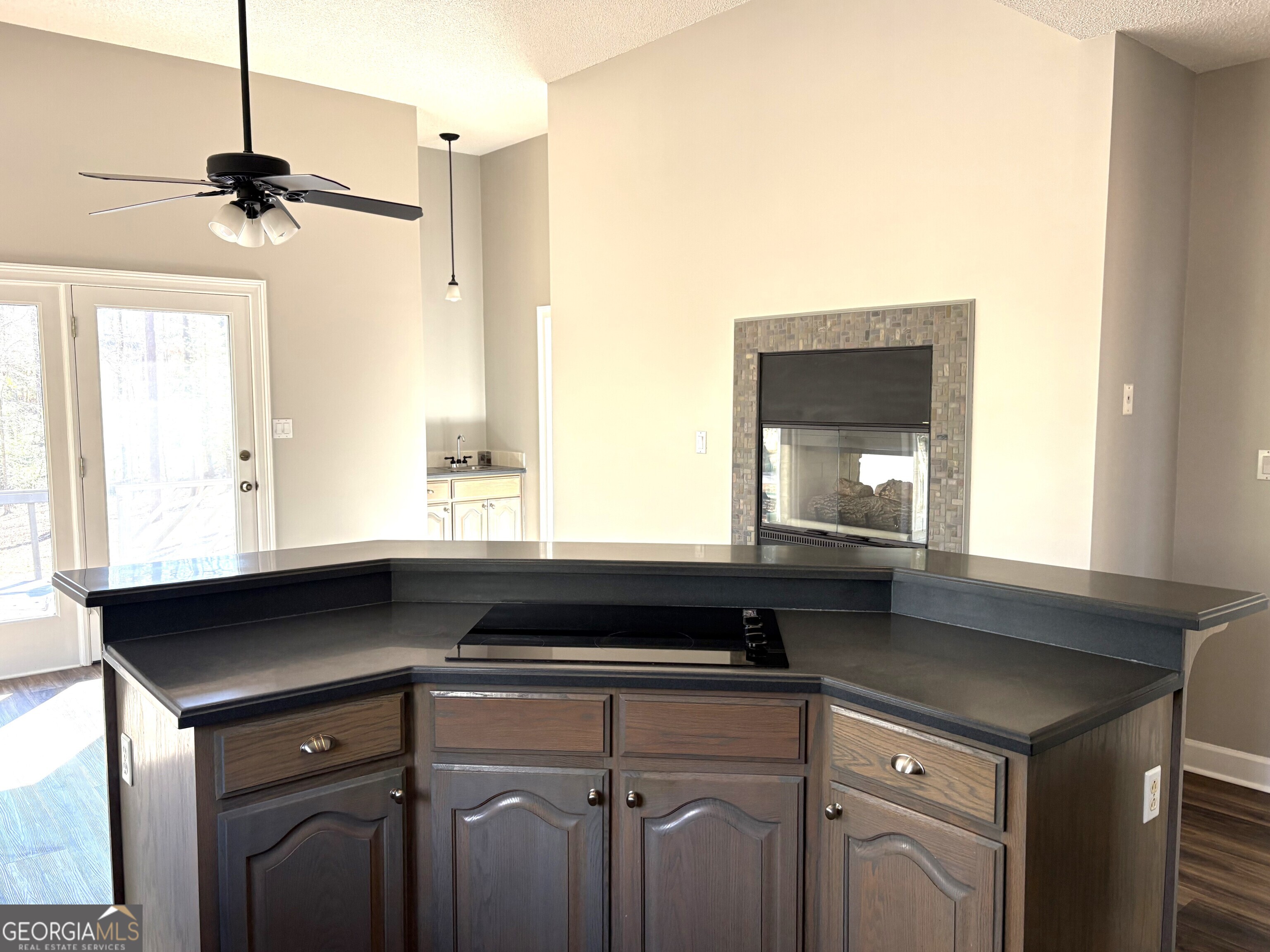245 Woodland Street Dublin, GA 31021 - Photo 6 of 48 a kitchen with a sink and a window