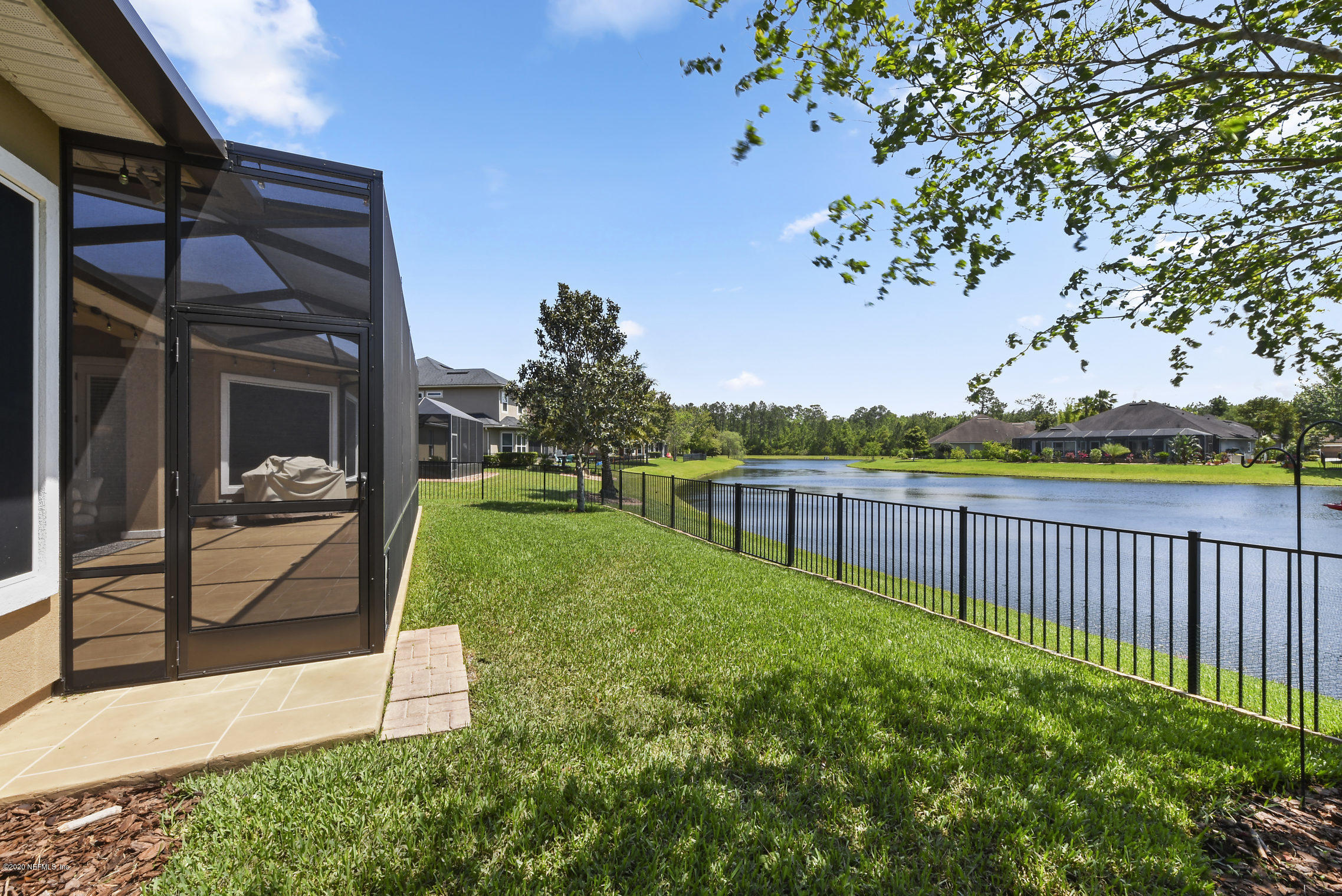 537 Saddlestone Drive St. Johns, FL 32259 - Photo 45 of 50 a view of a chair and table in the garden