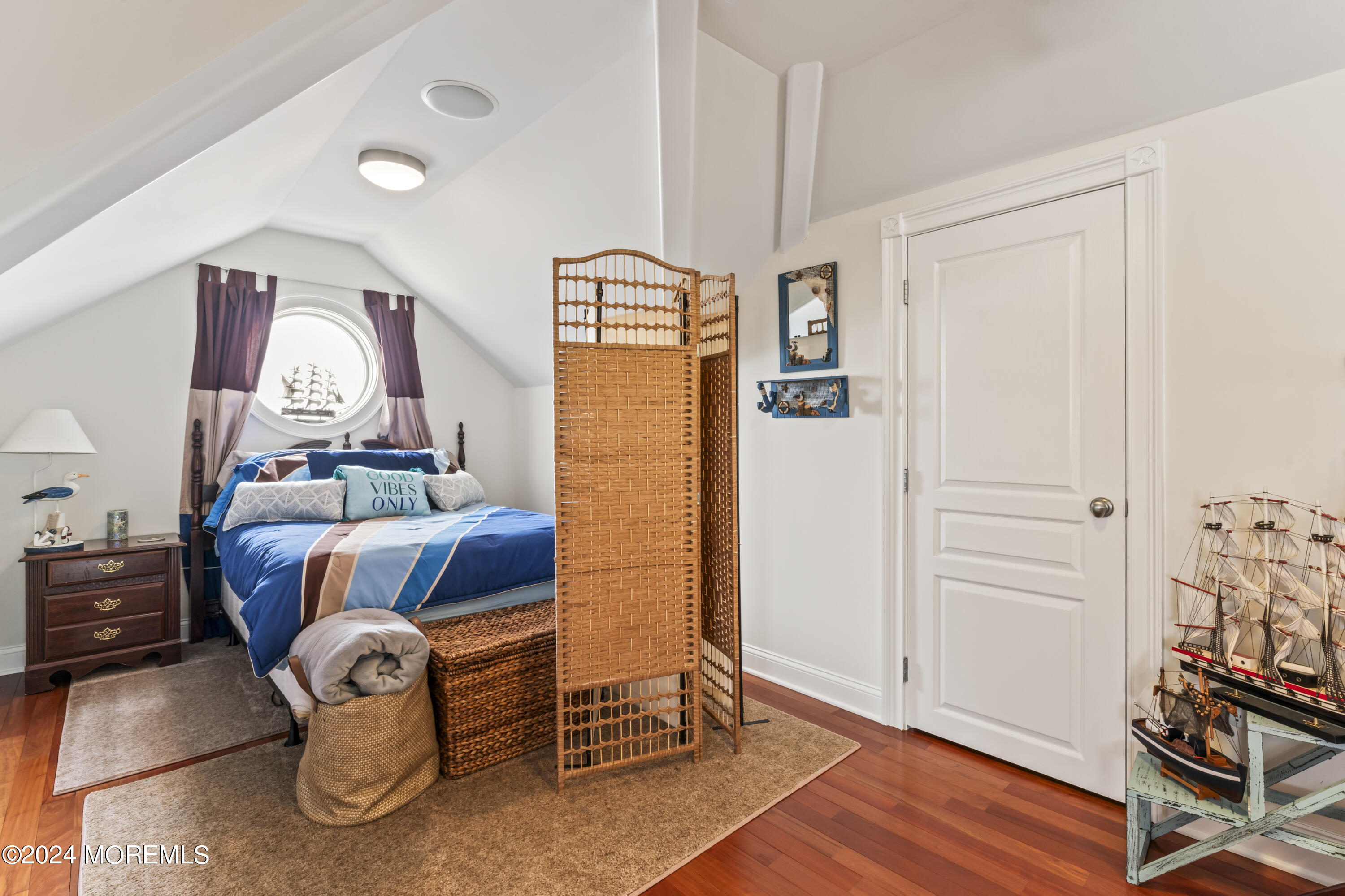113 Stillwater Road Barnegat, NJ 08005 - Photo 14 of 61 a room with furniture and wooden floor