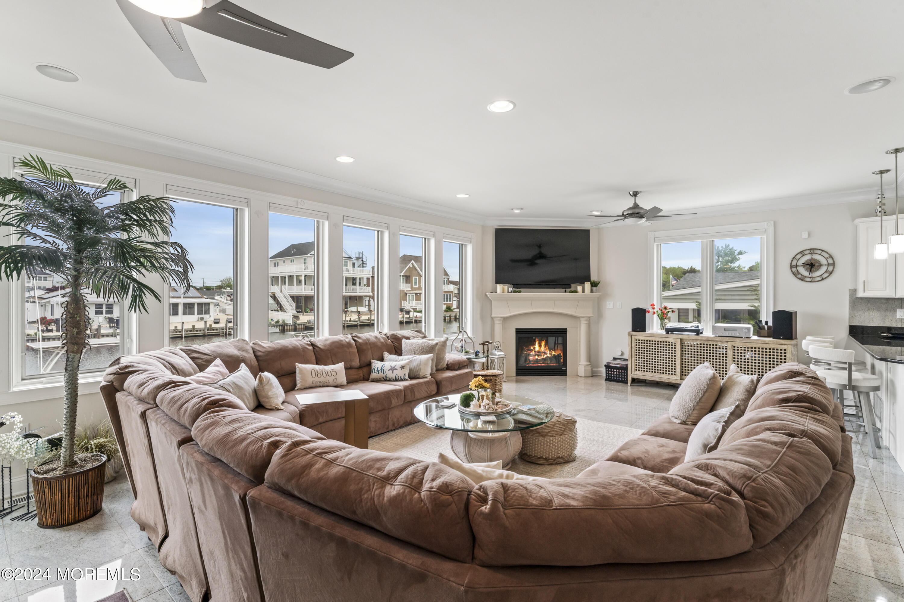 113 Stillwater Road Barnegat, NJ 08005 - Photo 40 of 61 a living room with furniture fireplace and a large window