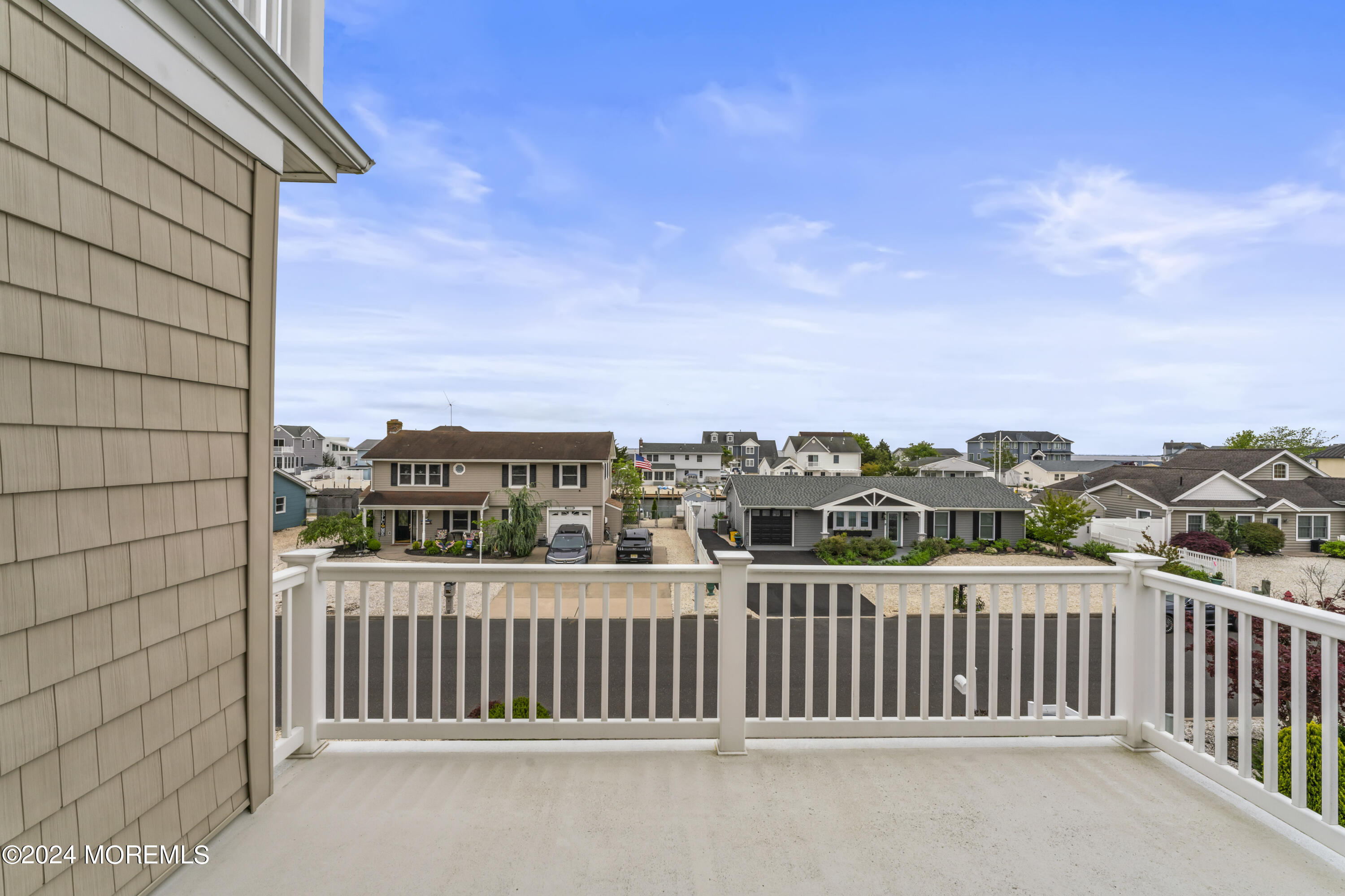 113 Stillwater Road Barnegat, NJ 08005 - Photo 50 of 61 a view of a balcony with city view