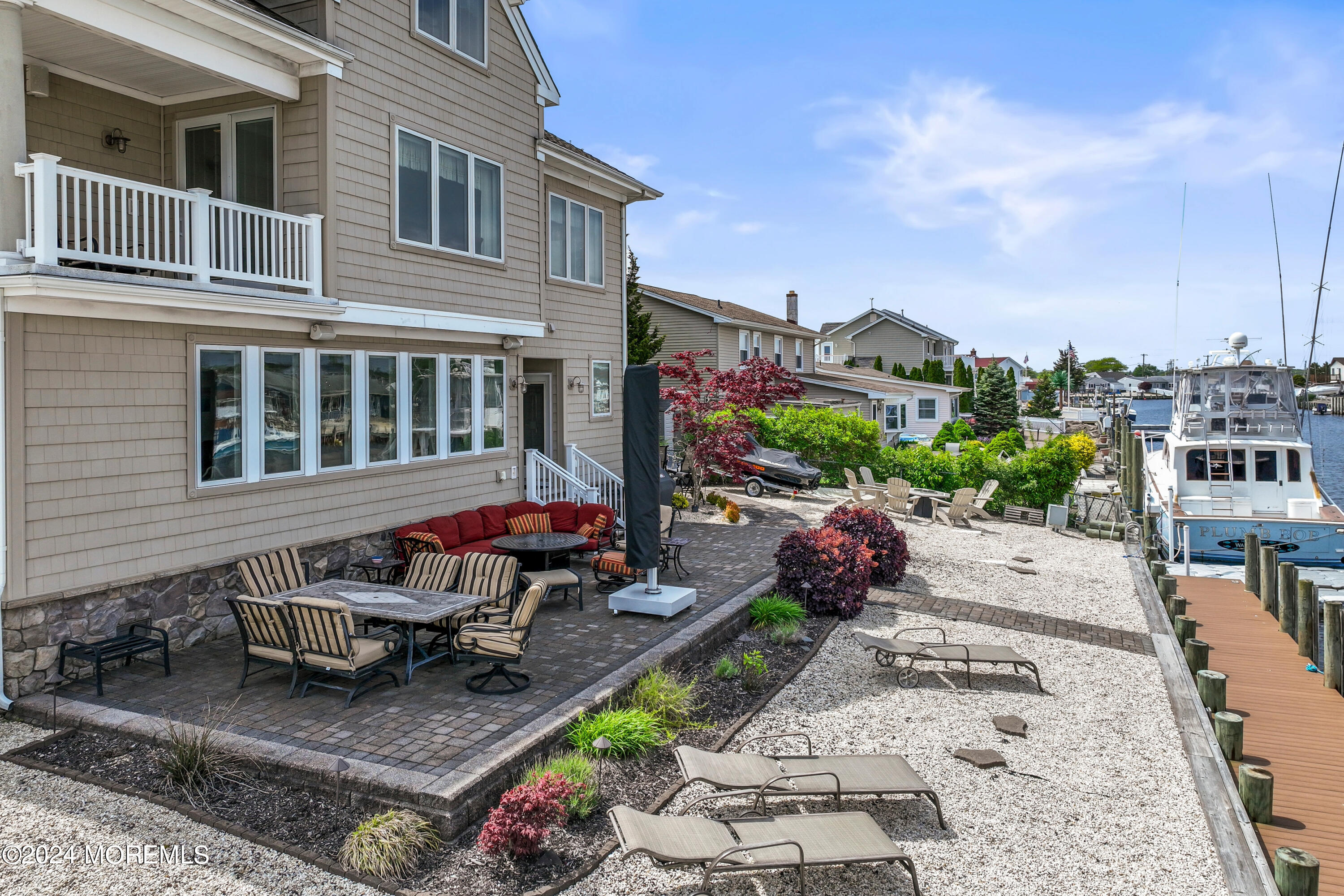 113 Stillwater Road Barnegat, NJ 08005 - Photo 61 of 61 a front view of a house with patio