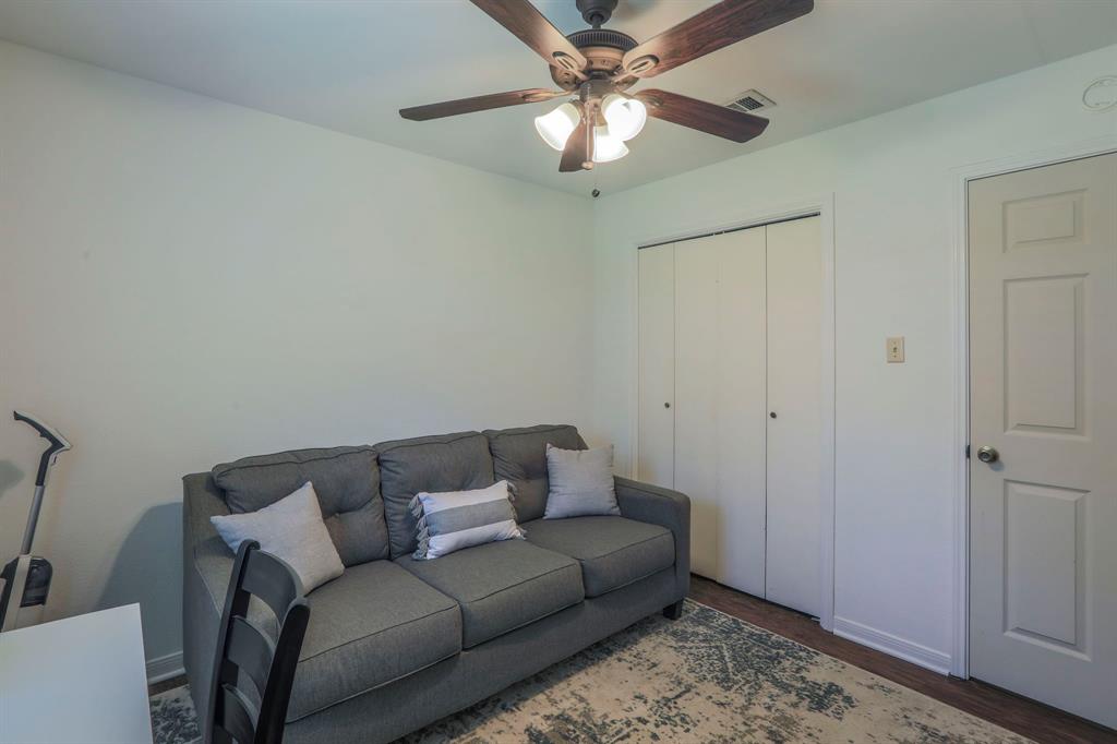 1815 Riata Drive Woodway, TX 76712 - Photo 14 of 25 a living room with furniture and a ceiling fan