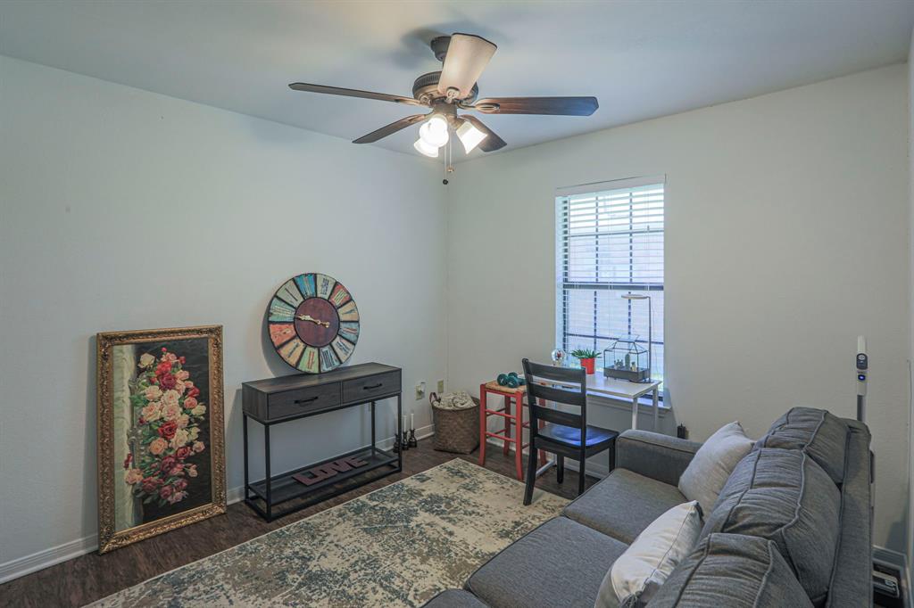 1815 Riata Drive Woodway, TX 76712 - Photo 15 of 25 a living room with furniture and a window