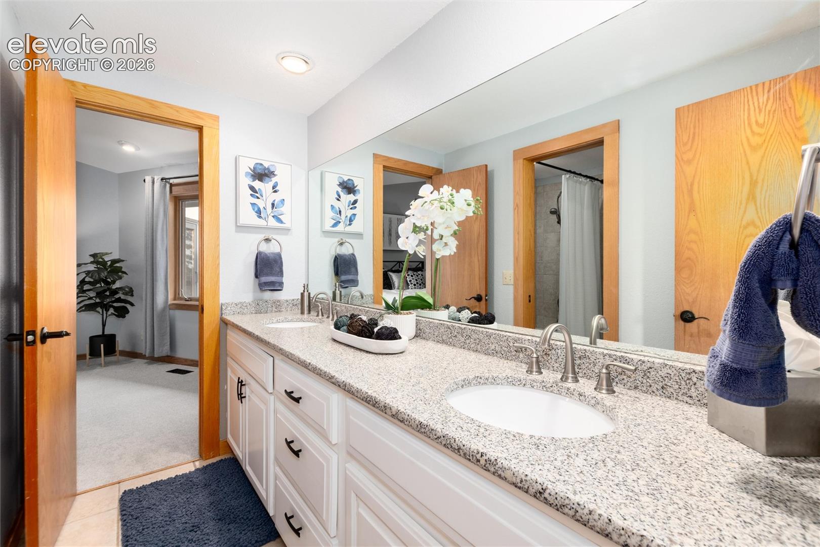 12730 Bridle Bit Road Colorado Springs, CO 80908 - Photo 17 of 48 Shared full bathroom for spare bedrooms