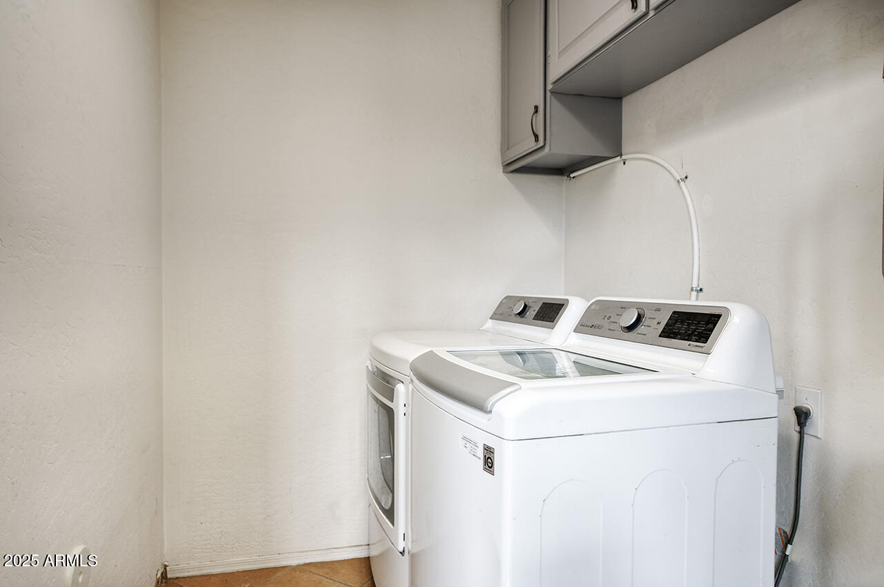 10617 West Coronado Road Avondale, AZ 85392 - Photo 12 of 32 a utility room with dryer and washer